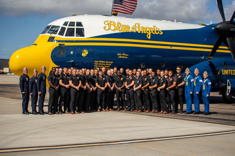 Marines with the Battle Color Detachment catch a flight with the U.S. Navy Blue Angels