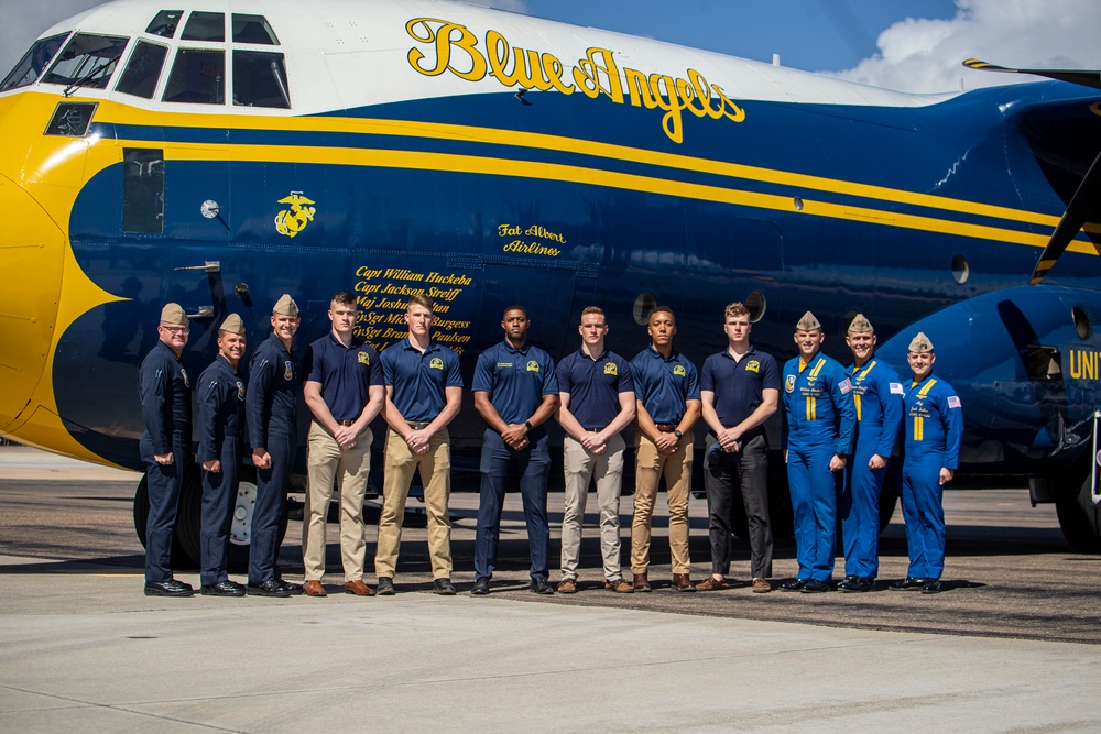 Marines with the Battle Color Detachment catch a flight with the U.S. Navy Blue Angels