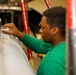 Abraham Lincoln Sailors conduct aircraft maintenance