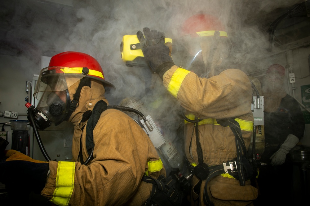 Sailors Practice Firefighting During General Quarters