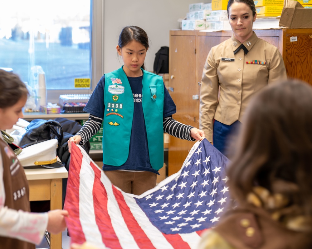U.S. Marines Conduct Flag Folding For Girl Scouts Troop 3367