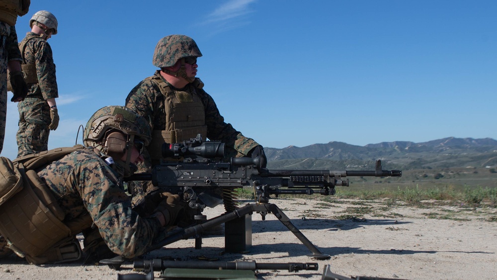 Marines and Sailors of 1st Supply Battalion participate in a live-fire machine gun range