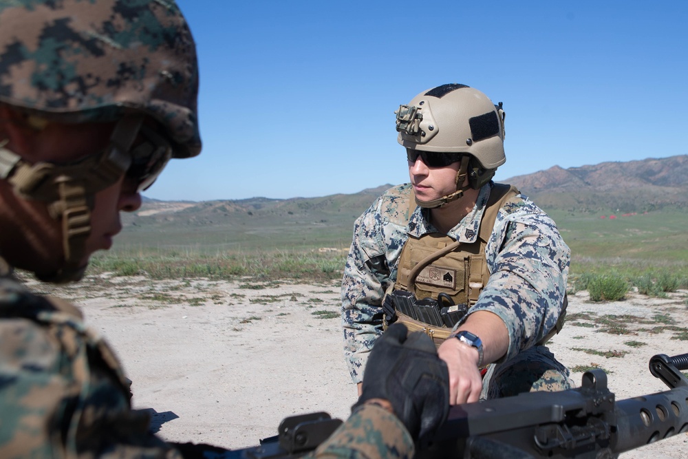 Marines and Sailors of 1st Supply Battalion participate in a live-fire machine gun range