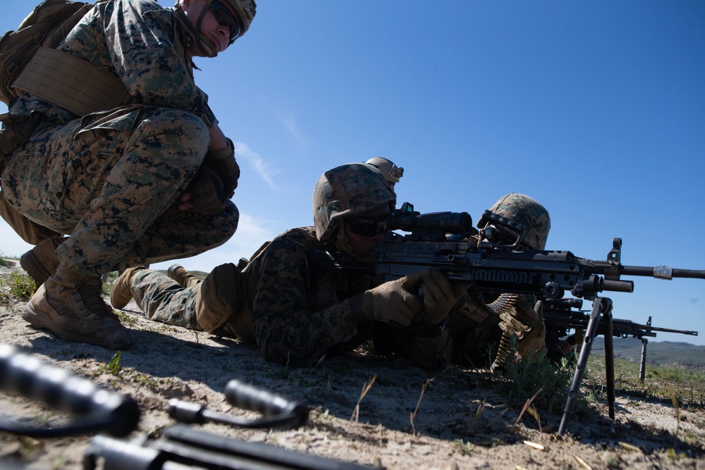 Marines and Sailors of 1st Supply Battalion participate in a live-fire machine gun range