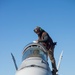 Sailor Conducts Maintenance On An F/A-18F Super Hornet