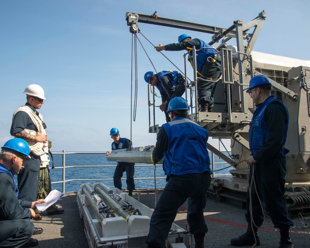 GHWB Sailors Load Ordnance for RAM