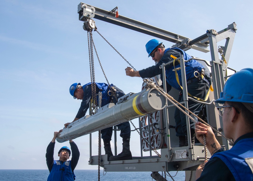 GHWB Sailors Load Ordnance for RAM