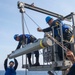 GHWB Sailors Load Ordnance for RAM