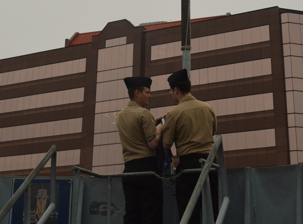 Raising the Navy jack on Battleship Wisconsin