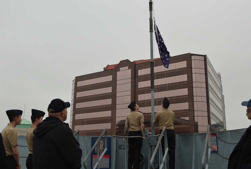 Raising the Navy jack on Battleship Wisconsin