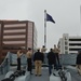 Raising the Navy jack on Battleship Wisconsin