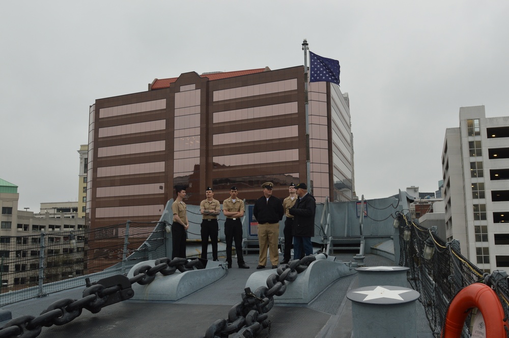 Raising the Navy jack on Battleship Wisconsin