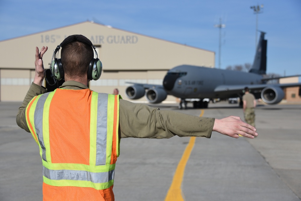 KC-135 crew chief marshaling