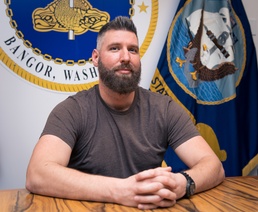 TRFB Employee Poses For Photo