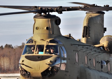 Photo Essay: Crew guides CH-47 Chinook for sling-load training support at Fort McCoy