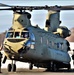 Crew guides CH-47 Chinook for sling-load training support at Fort McCoy