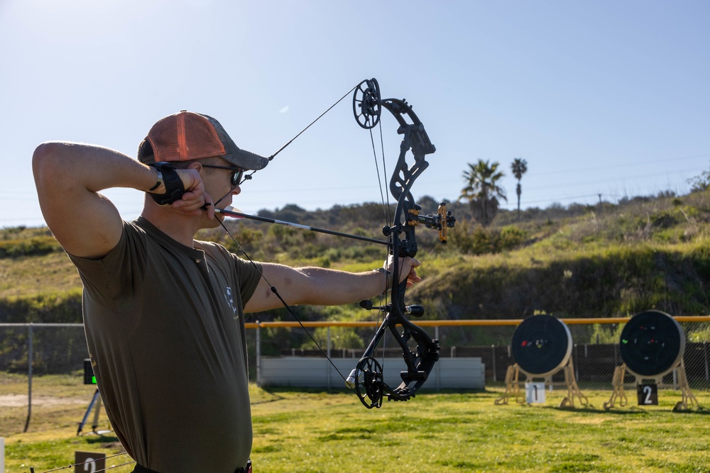 U.S. Marines with Wounded Warrior Regiment compete in the Marine Corps Trials the Archery competition