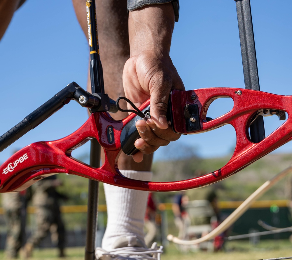 U.S. Marines with Wounded Warrior Regiment compete in the Marine Corps Trials the Archery competition