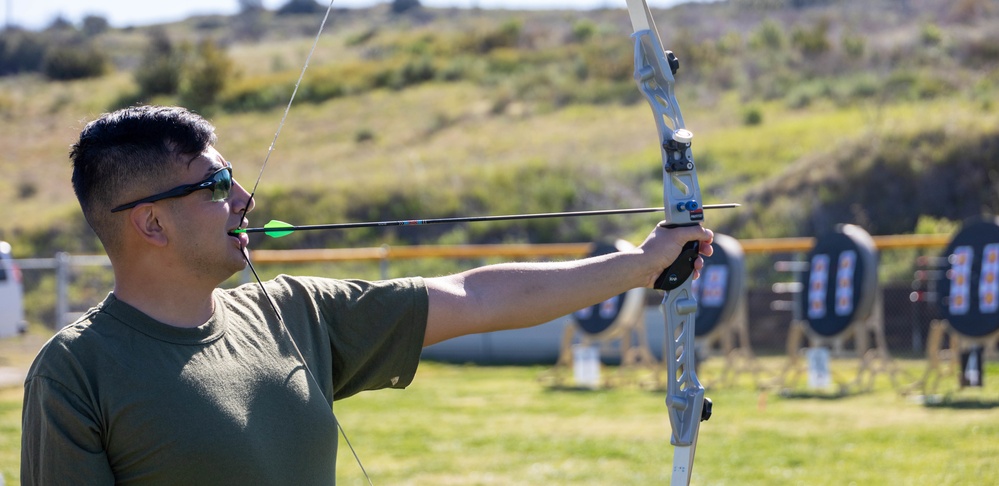 U.S. Marines with Wounded Warrior Regiment compete in the Marine Corps Trials the Archery competition