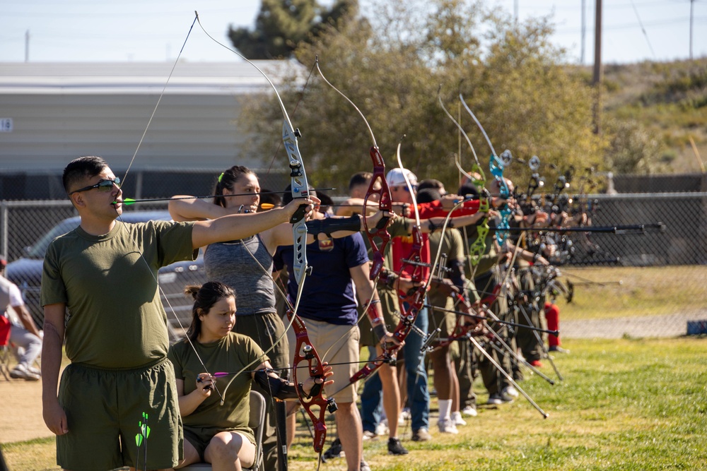 U.S. Marines with Wounded Warrior Regiment compete in the Marine Corps Trials the Archery competition