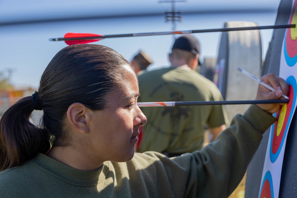 U.S. Marines with Wounded Warrior Regiment compete in the Marine Corps Trials the Archery competition