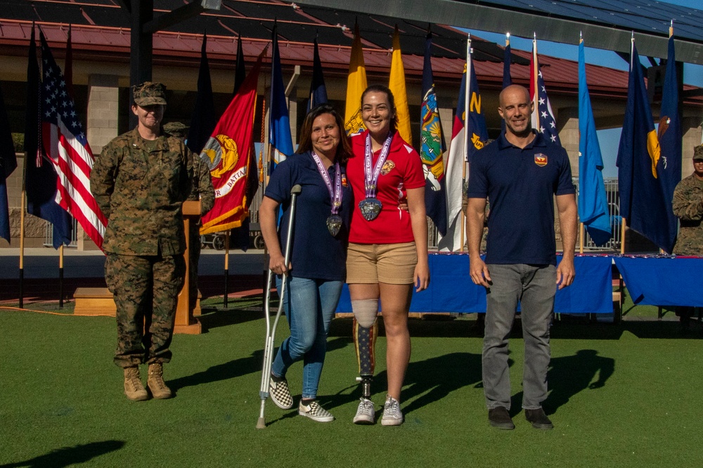 U.S. Marines with Wounded Warrior Regiment attend the Marine Corps Trials Closing Ceremony