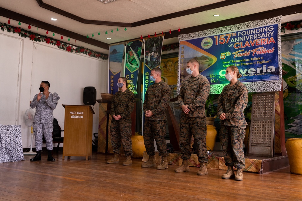 Members of the Armed Forces of the Philippines and U.S. Marines attended a local municipal founding anniversary event during Balikatan 22