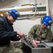 Sailors perform maintenance