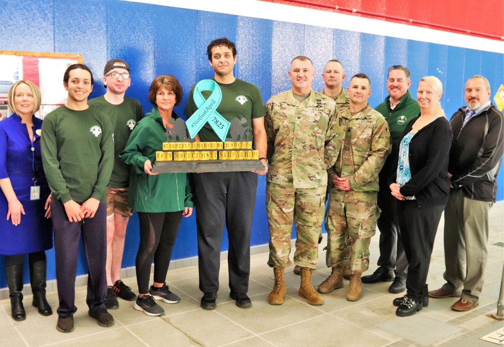 'Not Just April' trophy presented to DFMWR team at Fort McCoy