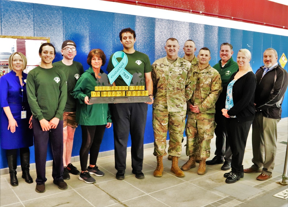 'Not Just April' trophy presented to DFMWR team at Fort McCoy