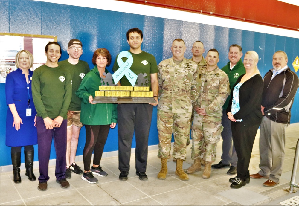 'Not Just April' trophy presented to DFMWR team at Fort McCoy