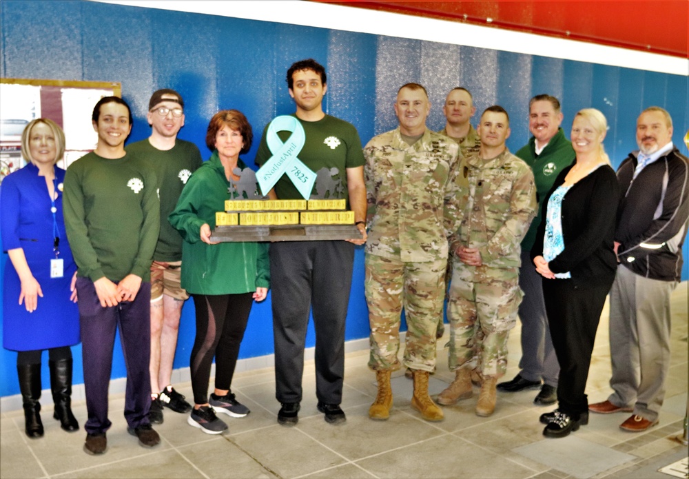 'Not Just April' trophy presented to DFMWR team at Fort McCoy