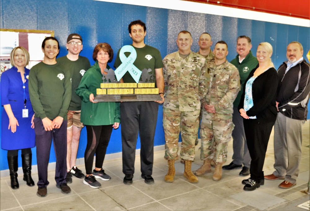 'Not Just April' trophy presented to DFMWR team at Fort McCoy