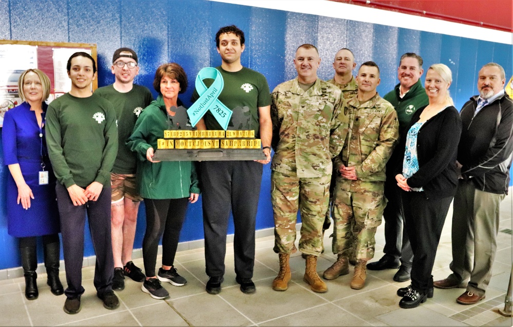 'Not Just April' trophy presented to DFMWR team at Fort McCoy