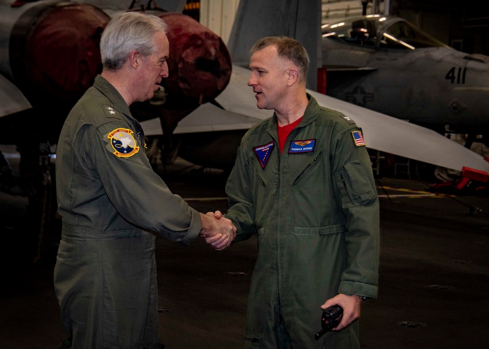 USS George H.W. Bush Hosts Rear Adm. John F. Meier