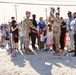 Brig. Gen. Curt Taylor and Col. Jason Clarke celebrate the library grand opening with community members