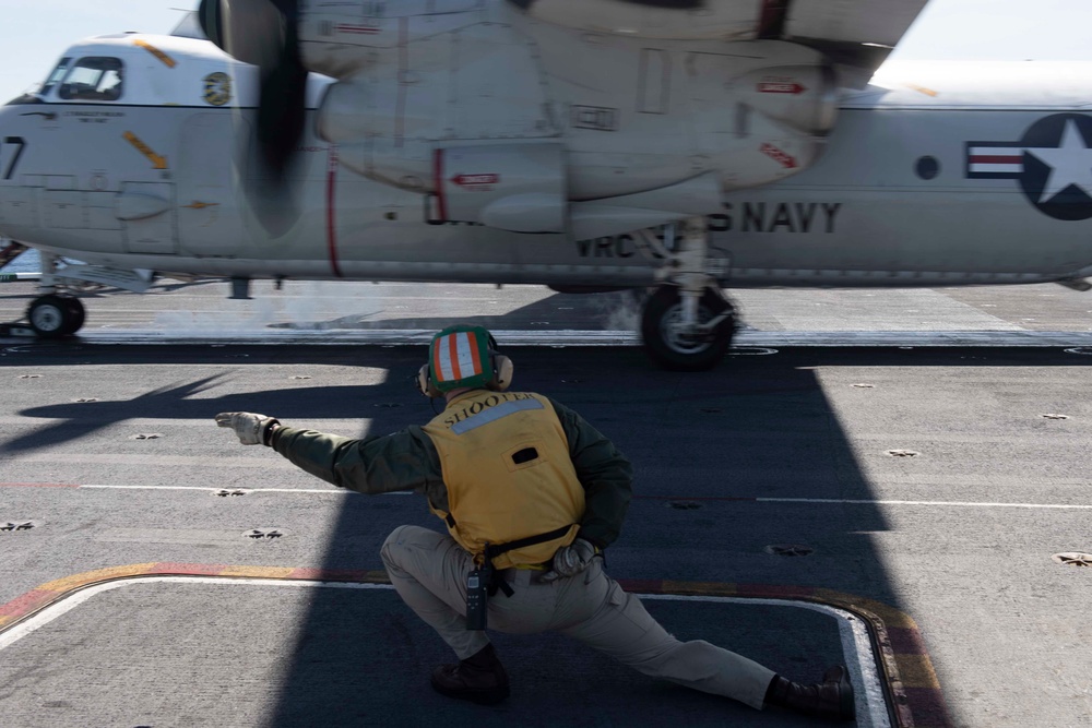 A C-2 Greyhound Launches From The Flight Deck