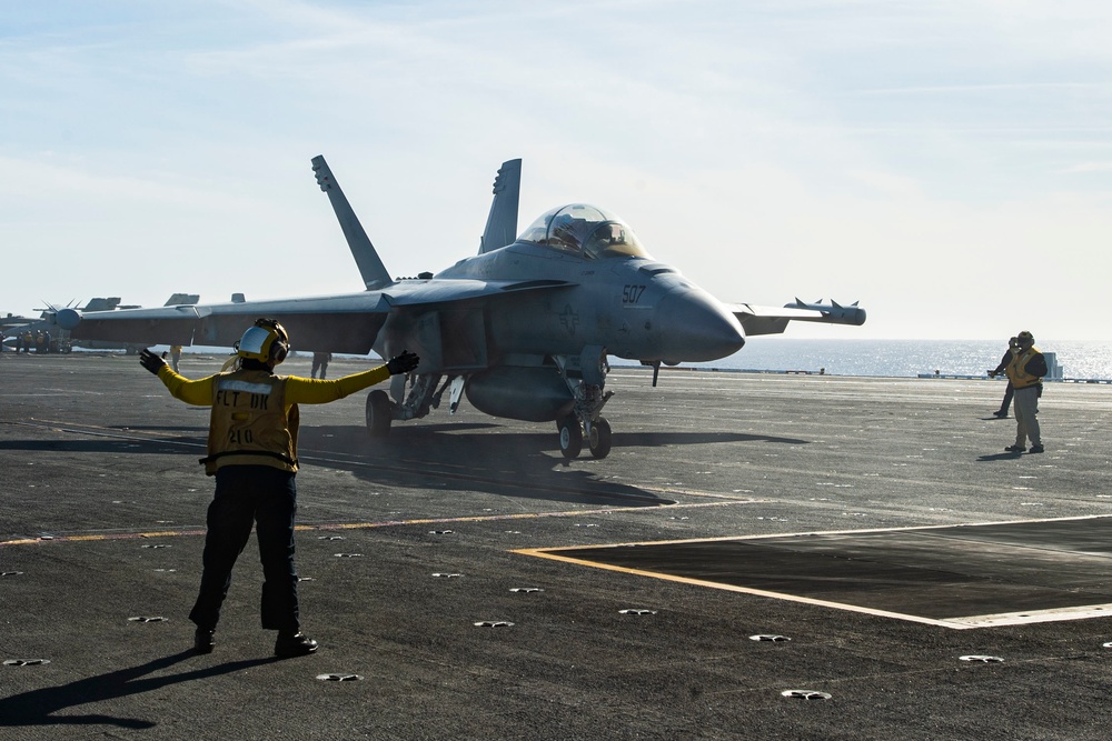 A Sailor Directs An Aircraft