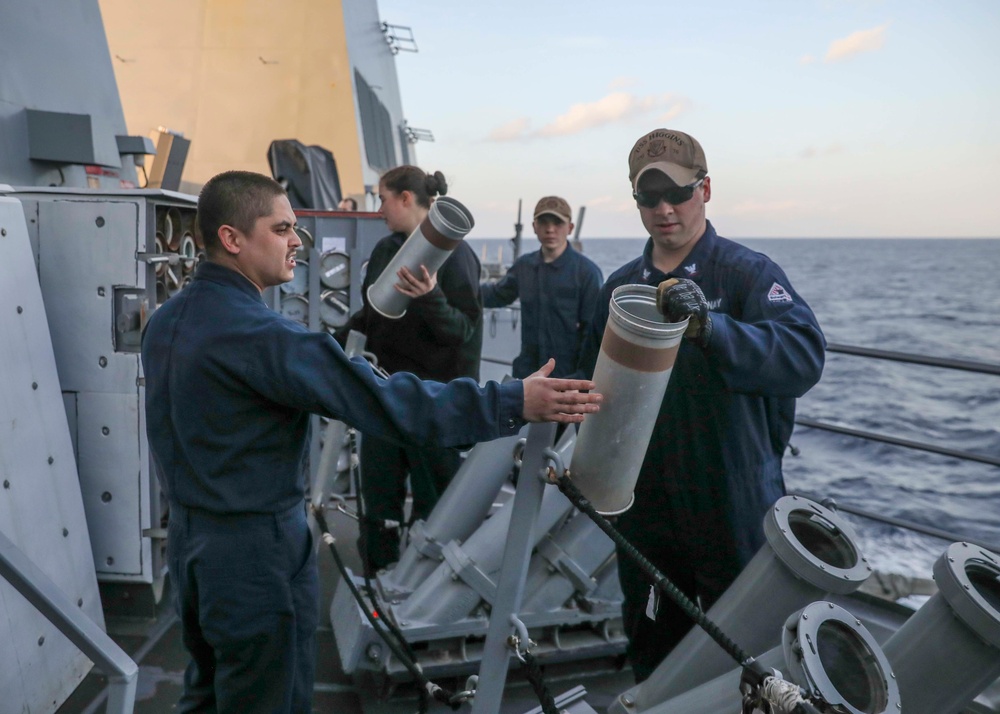Sailors Unload Chaff