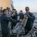 Sailors Unload Chaff