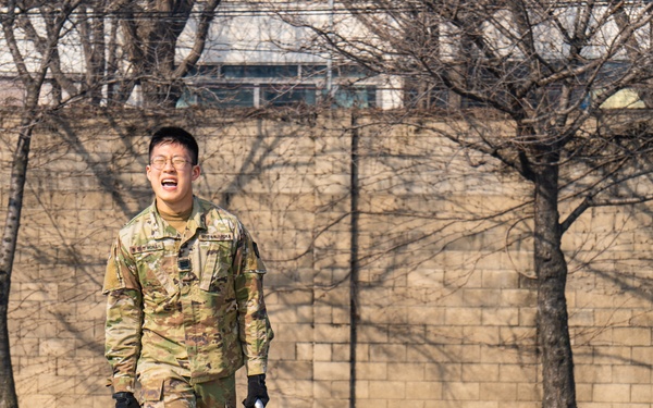 CPL. Jeong Hyun Won carries dumbbells