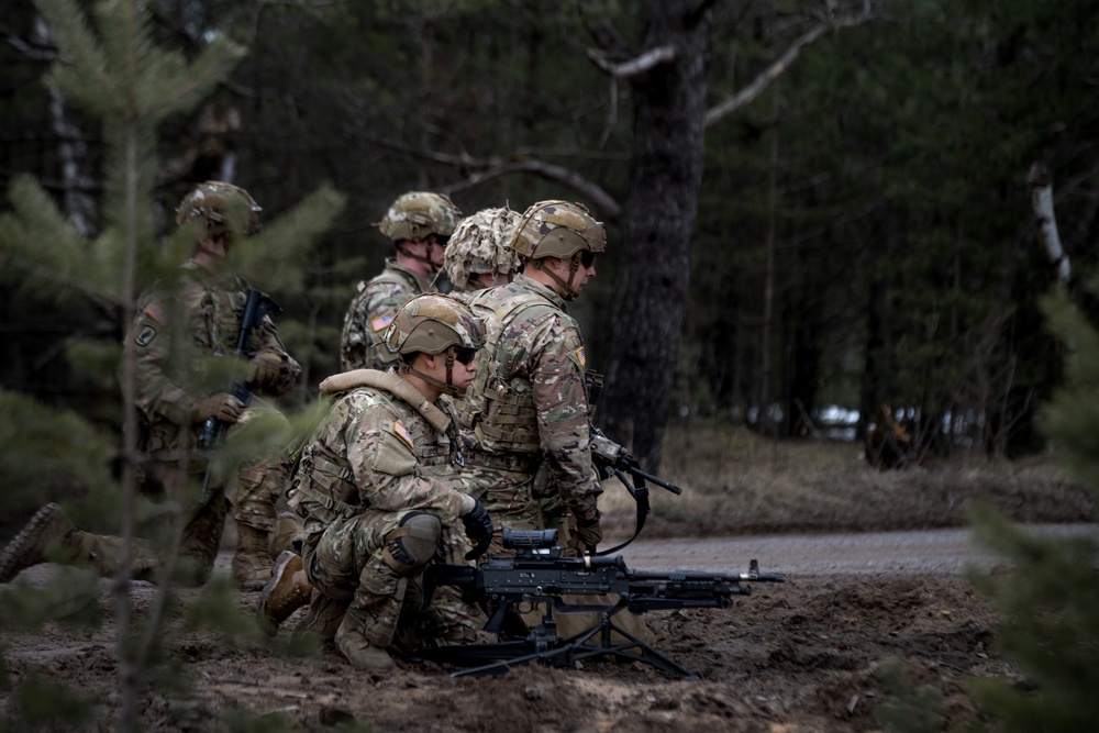 U.S. paratroopers execute multinational training during Saber Strike 22