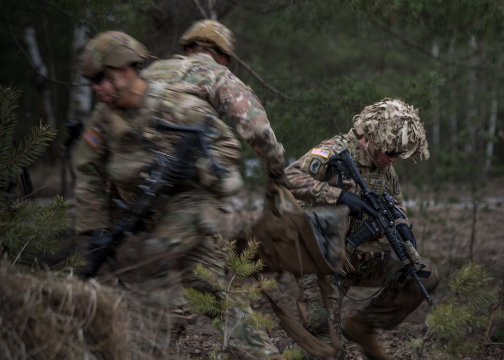 U.S. paratroopers execute multinational training during Saber Strike 22