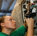Abraham Lincoln Sailors conduct aircraft maintenance