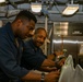Abraham Lincoln Sailors conduct aircraft maintenance