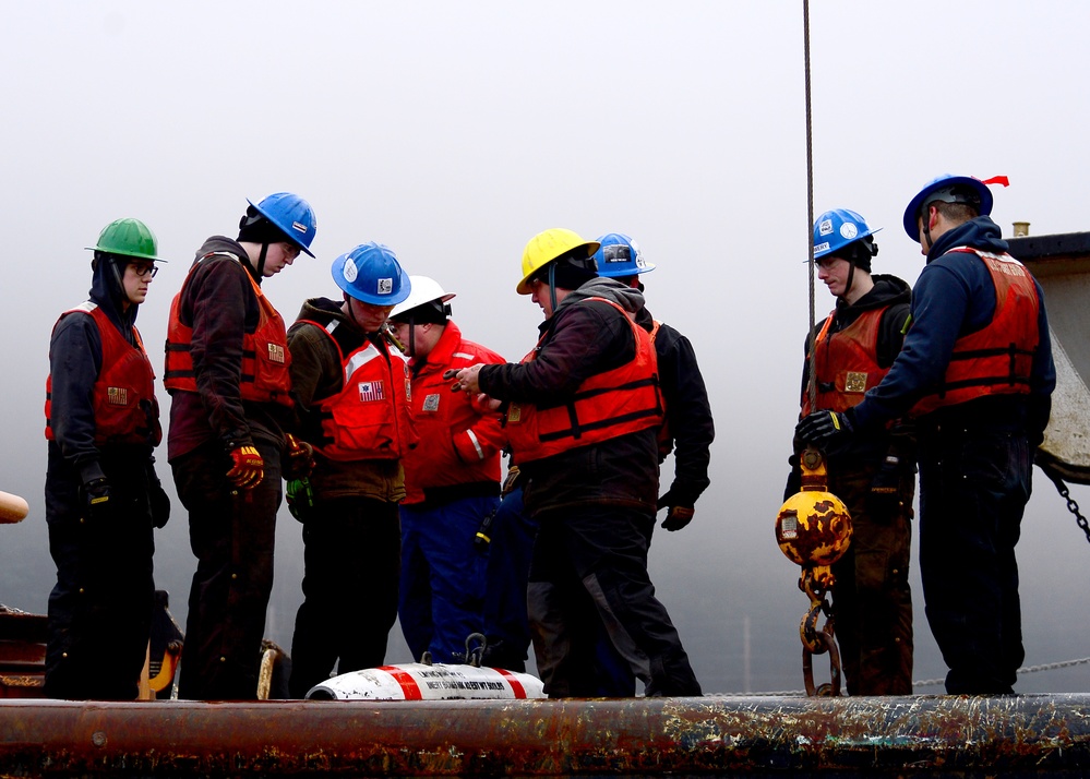 U.S. Coast Guard recovers training aids during Exercise ARCTIC EDGE 2022