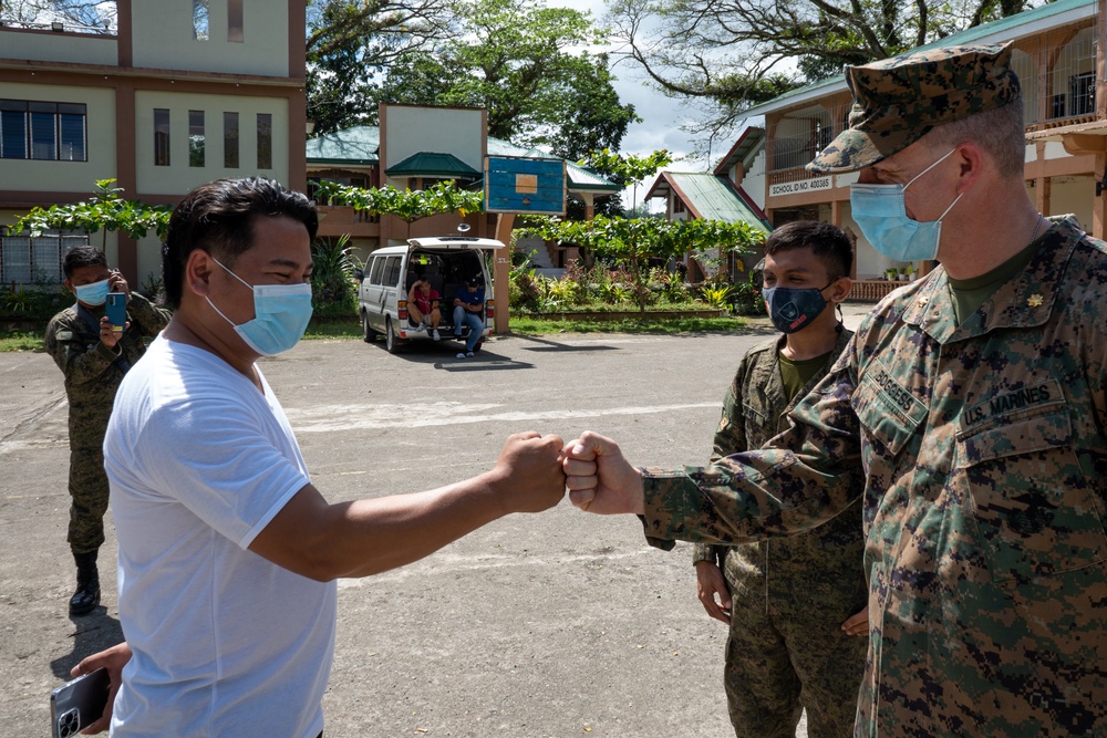 Armed Forces of the Philippines and U.S. Marines visit a local church ahead of Balikatan 22