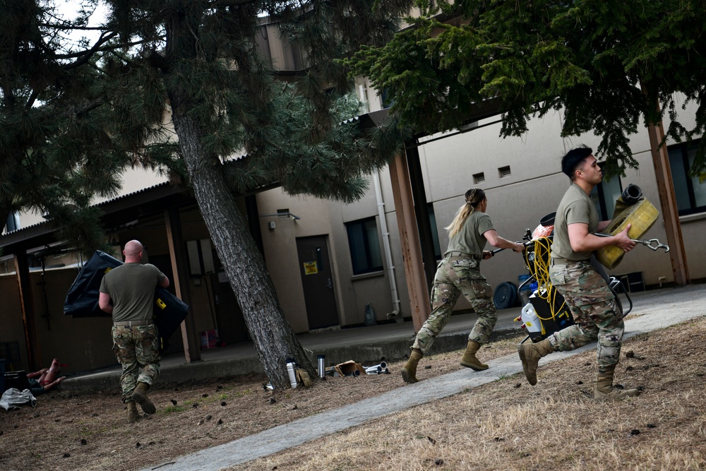 Wolf Pack medics assemble decon shelter systems