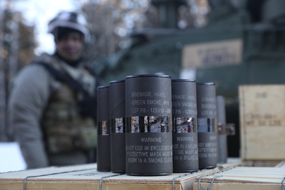 Smoke grenade canisters being supplied for convoy