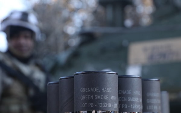 Smoke grenade canisters being supplied for convoy